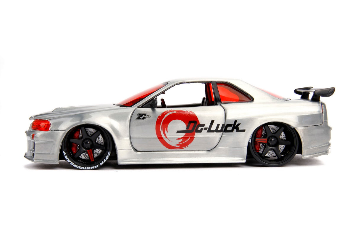 Macheta metalica nissan skyline gtr 2002 scara 1 la 24